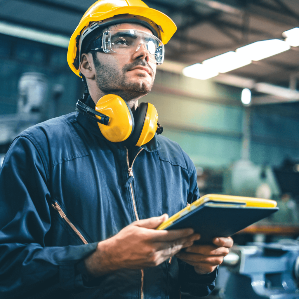 Man wearing noise protection to prevent hearing loss in the workplace
